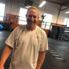 Man smiling after workout inside Manic Training gym Man smiling after workout inside Manic Training gym